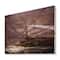 Designart - Lighthouse Shining Light During Stormy Night I - Nautical & Coastal Print on Natural Pine Wood